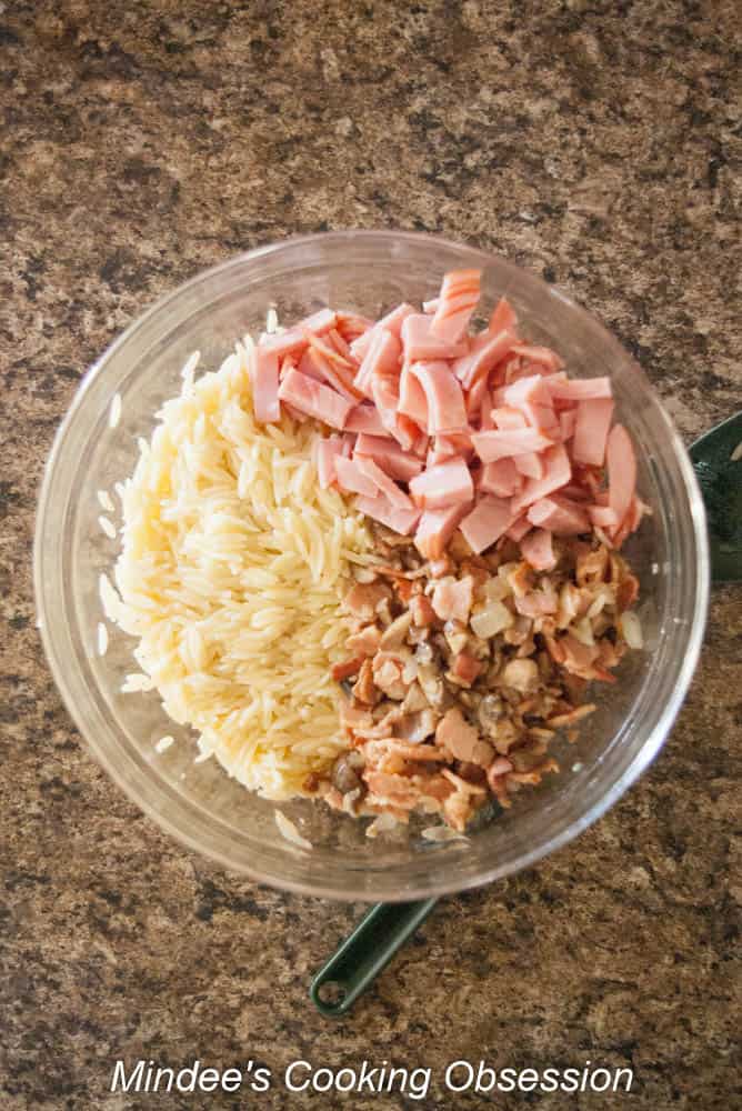 Italian Orzo Bacon Mushroom Bake ingredients in a mixing bowl.