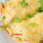 Cheesey Chicken Enchiladas Cheesy chicken enchiladas are a great make ahead dinner. These also freeze really well. If the full recipe is too much you can freeze half for another time!