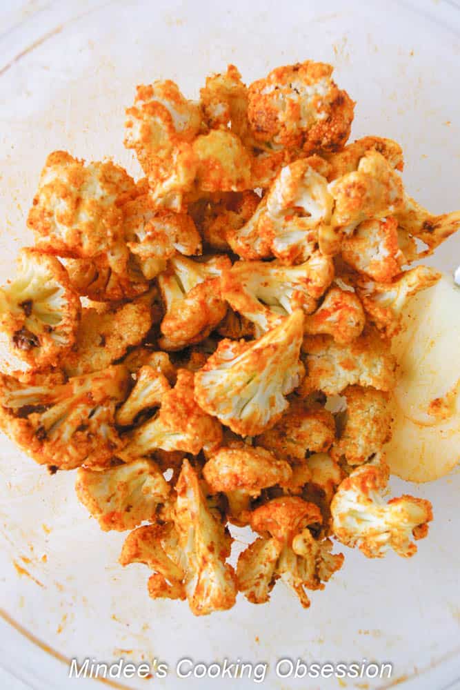 Cauliflower tossed with seasonings and melted butter.