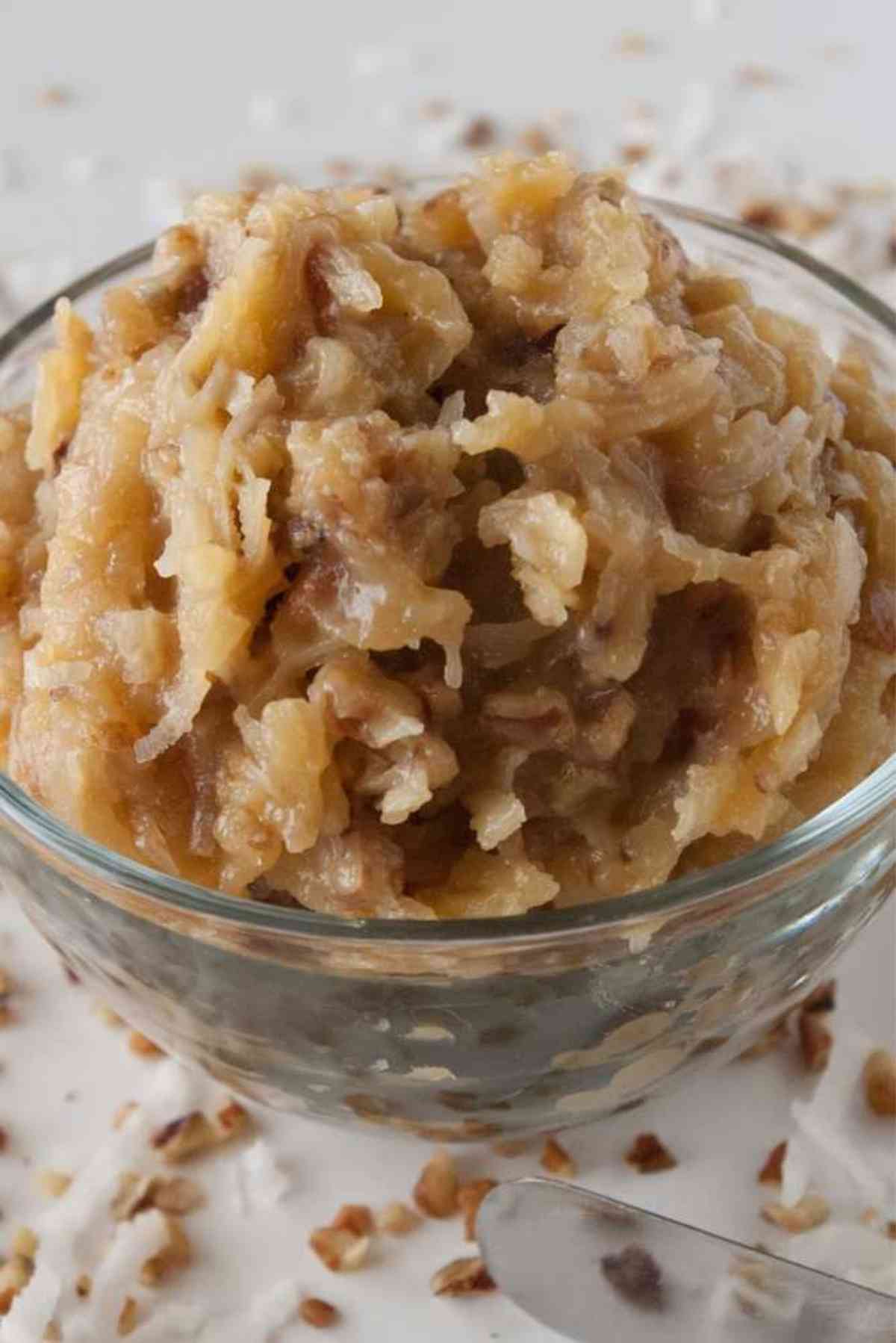 A little bowl of coconut pecan frosting.