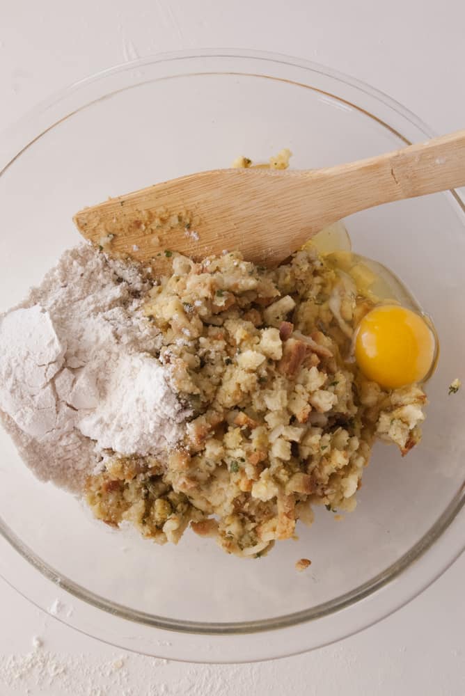 Leftover stuffing, flour and egg in a mixing bowl.