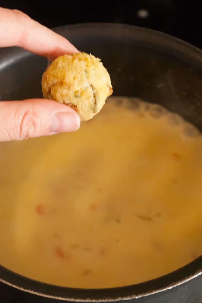 Stuffing dumpling rolled in a ball.