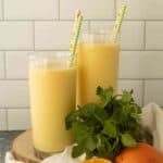 two tall glasses of orange julius