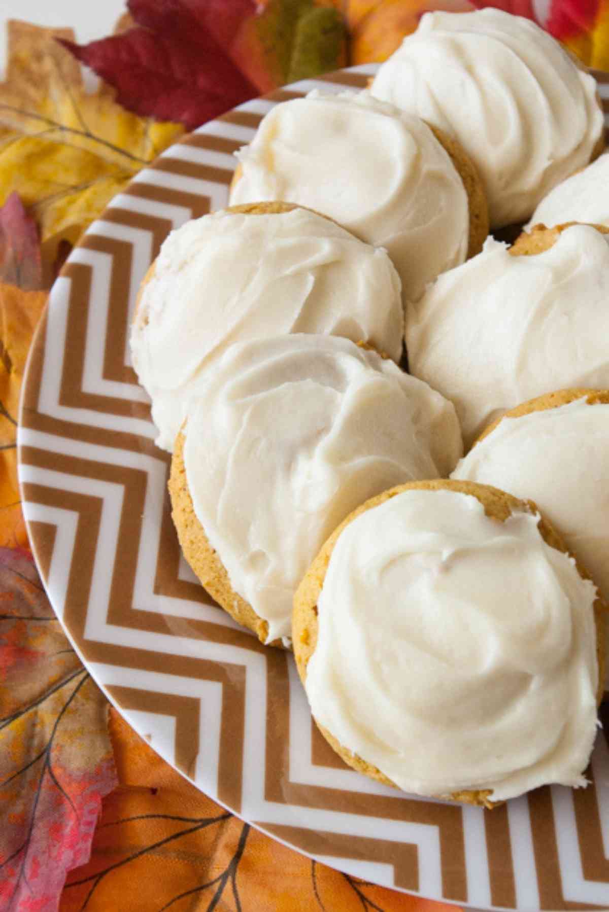 Plate of soft pumpkin cookies with cream cheese frosting!