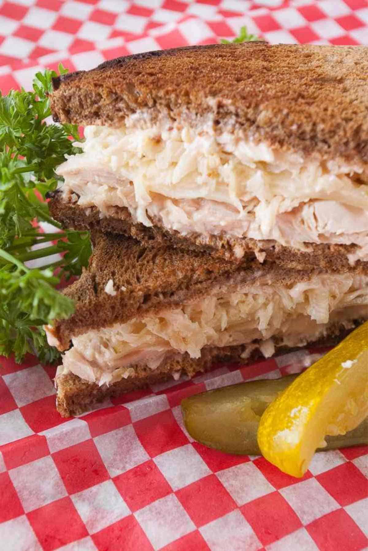 Turkey Reubens cut it half and served with a deli pickle.
