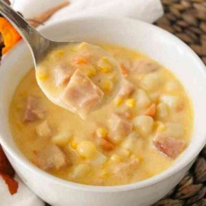 A big bowl of ham and cheese soup.