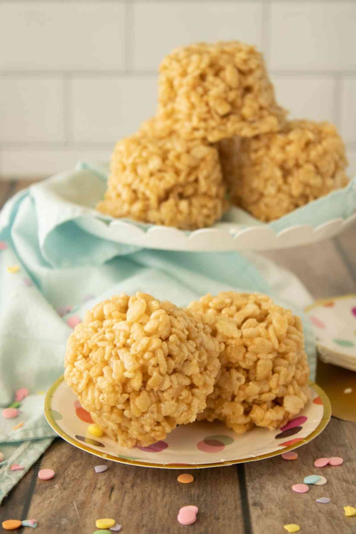 Easy caramel rice krispie treats on a party plate.