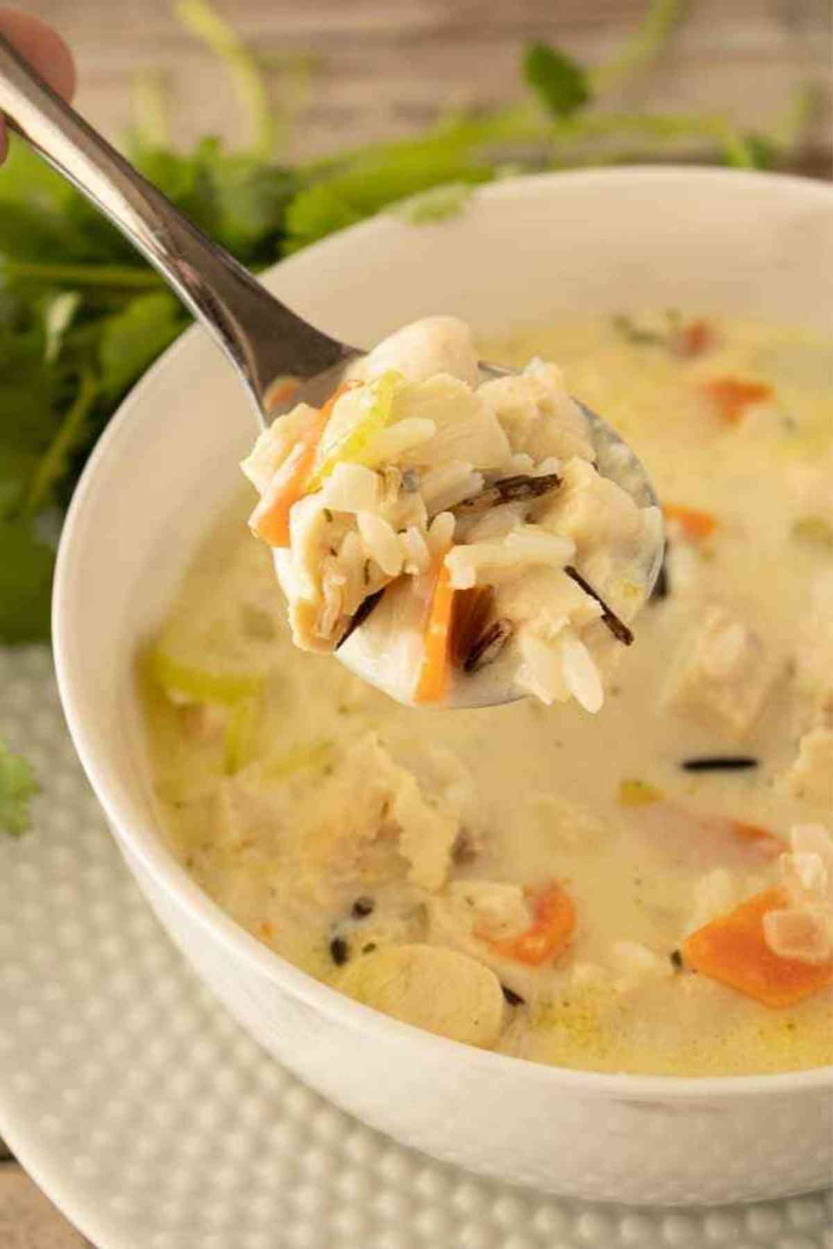 Spoonful of this creamy chicken soup with wild rice!