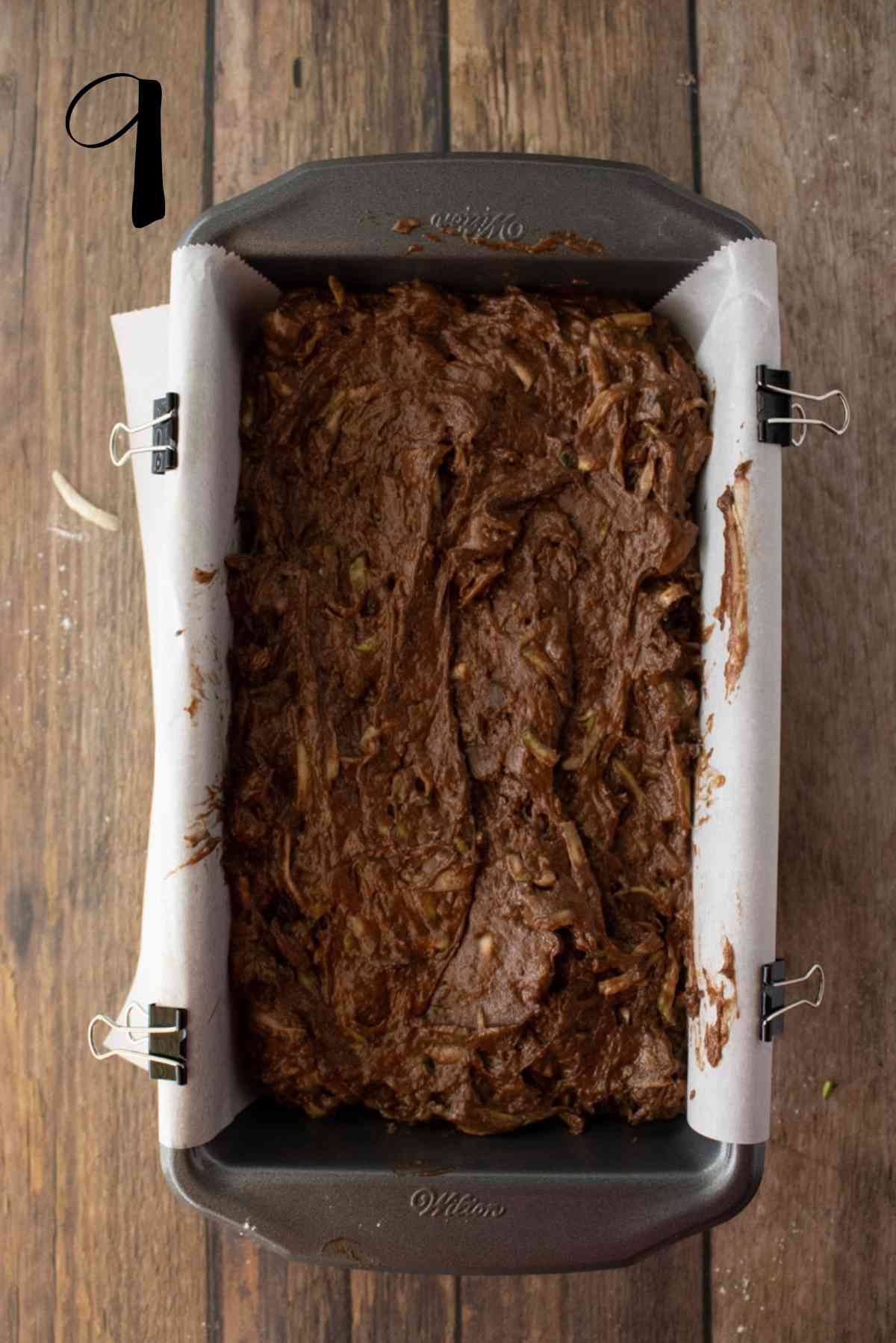 Spread the thick moist chocolate zucchini bread batter in the loaf pan.