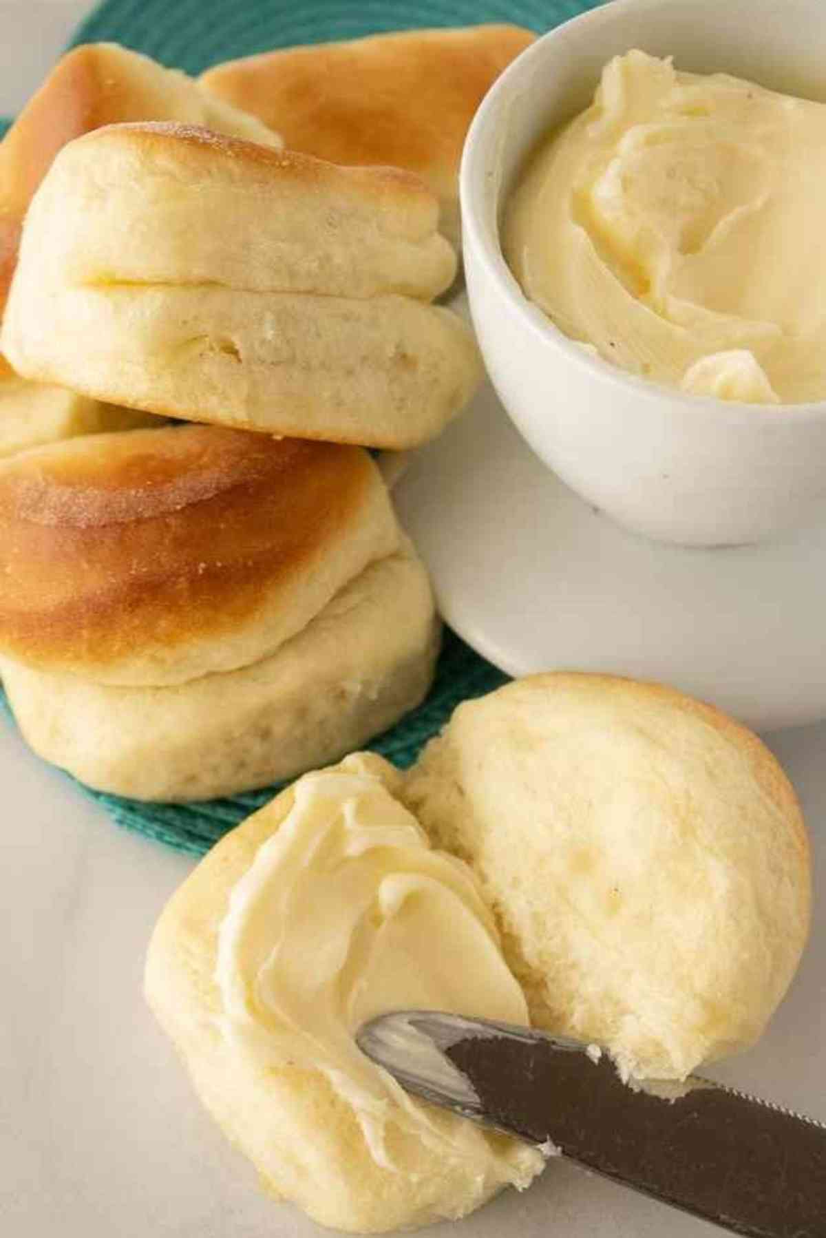 A buttered Parker House Roll