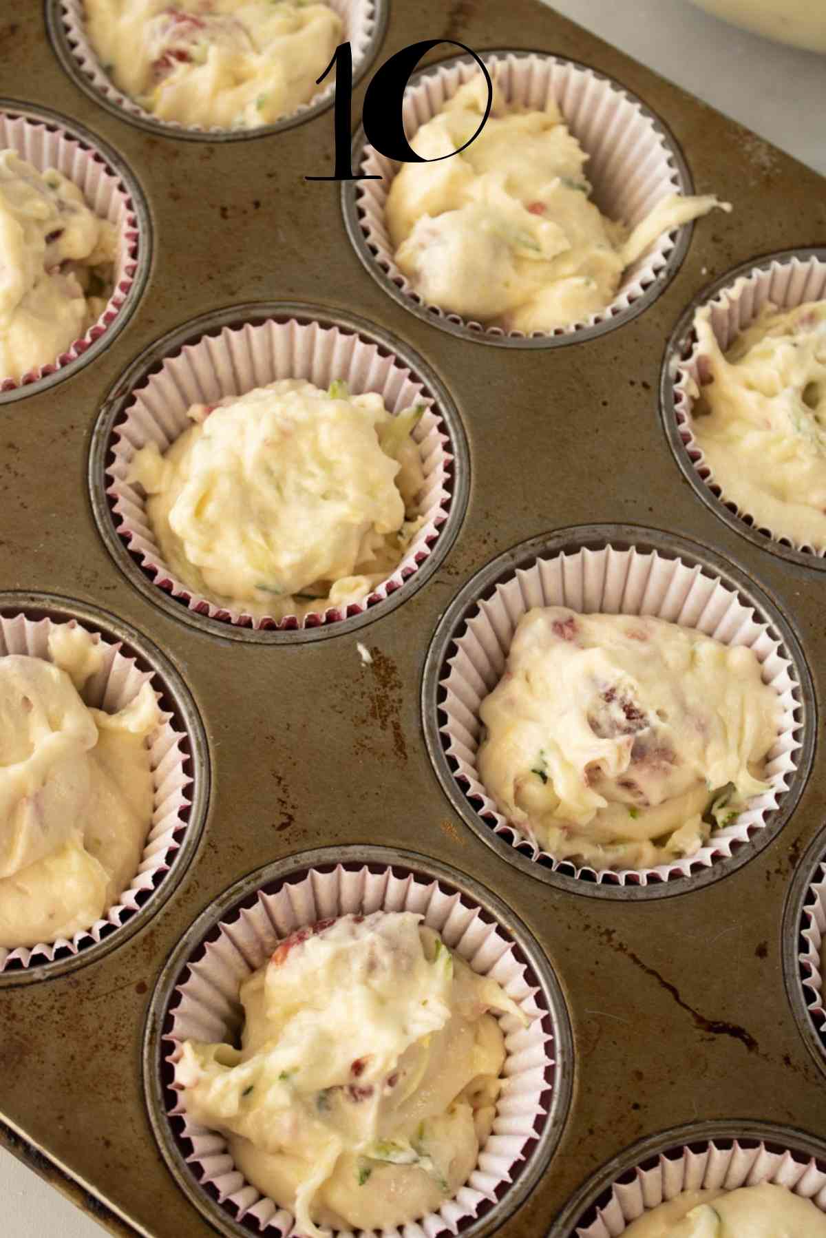 Fill 18 prepared muffin cups with batter.