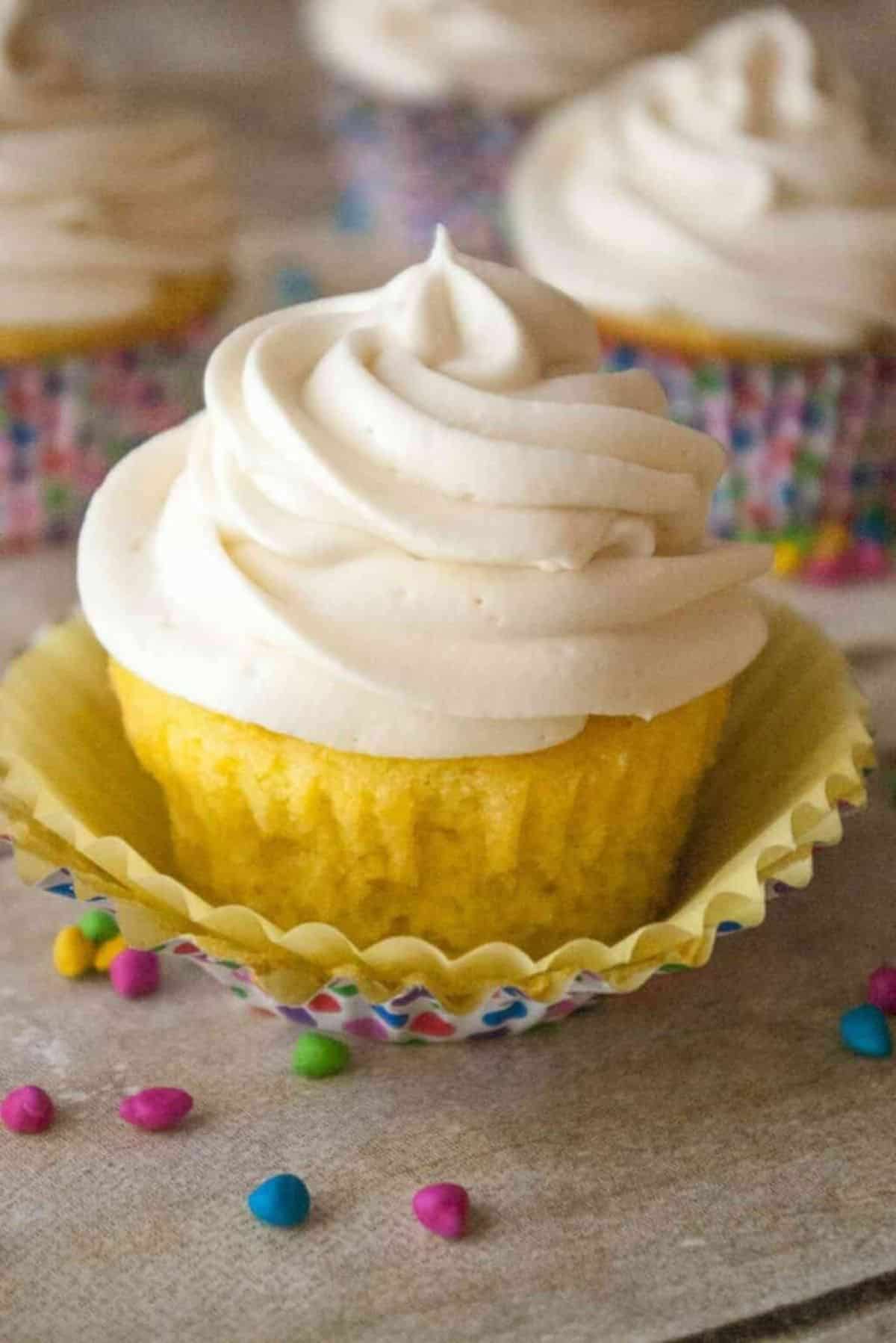 A cupcake with Whipped Cream Cheese Frosting.