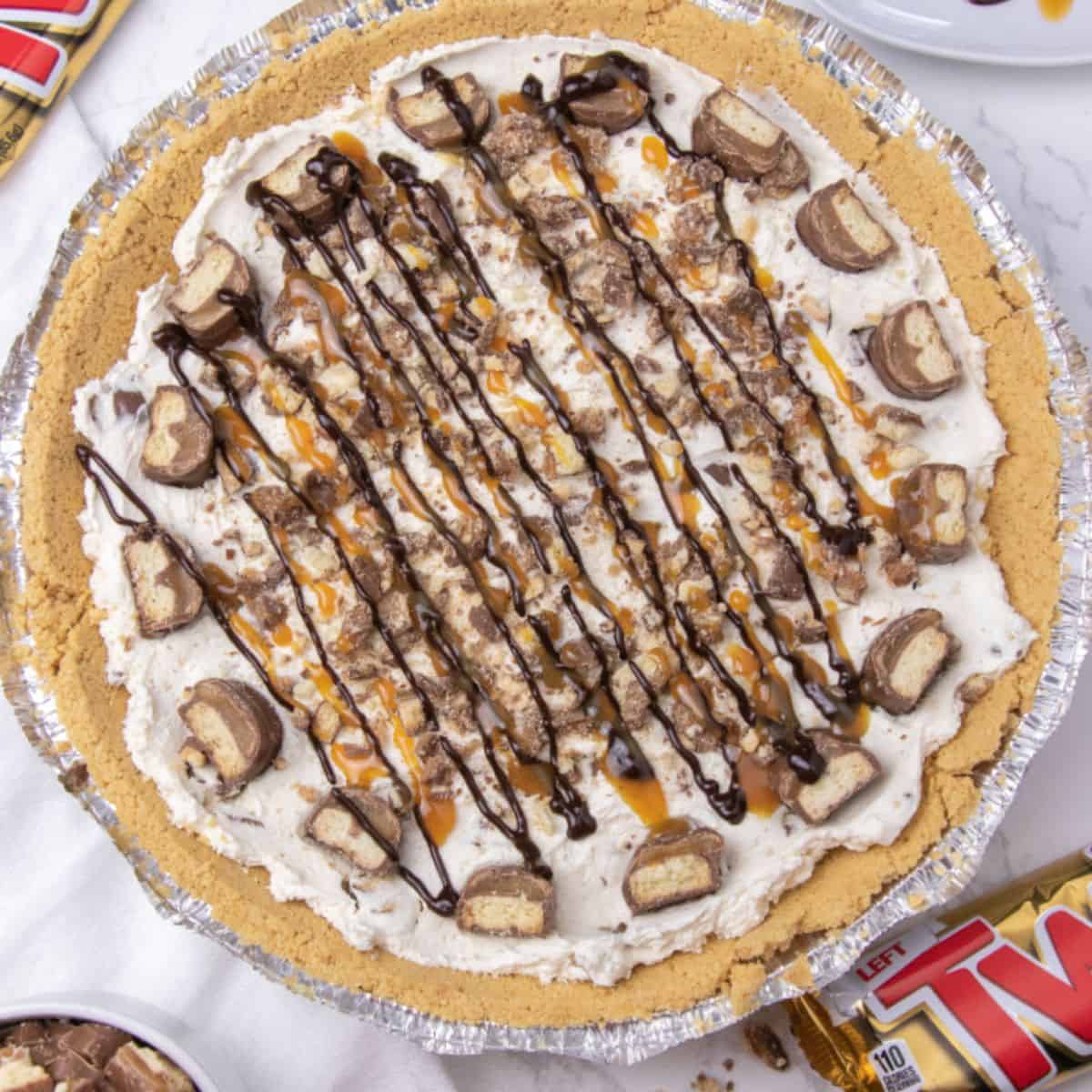 No Bake Twix Pie in a cake mold.