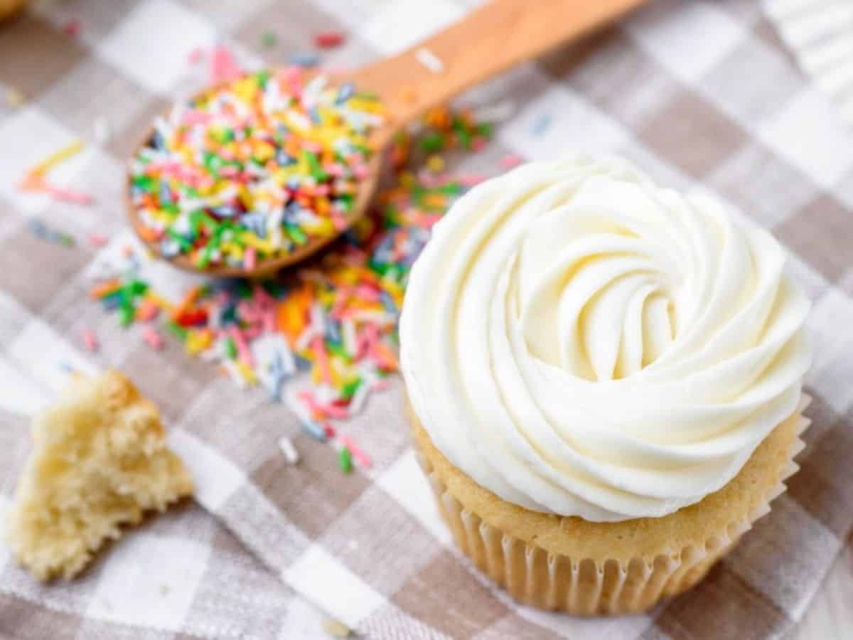 A cupcake with Bourbon Vanilla Buttercream Frosting.