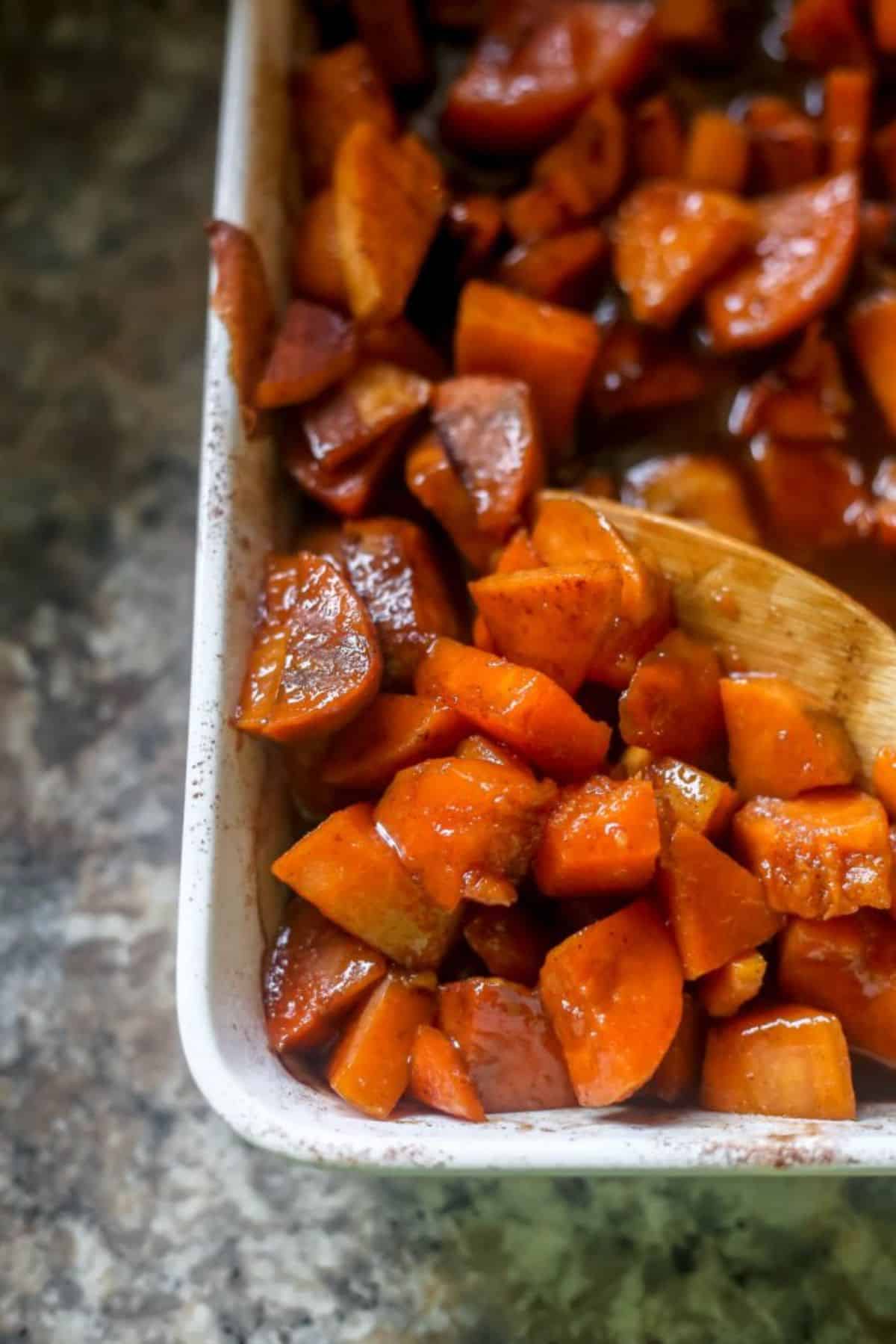 Candied Yams in a white casserole.