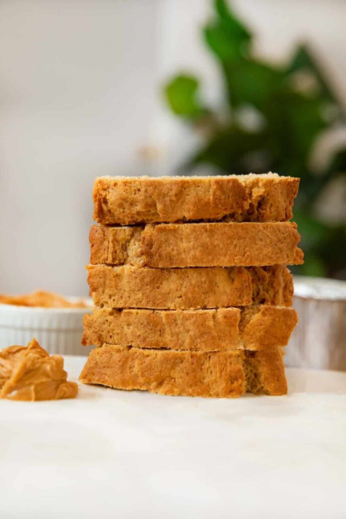 A pile of Peanut Butter Bread slices.