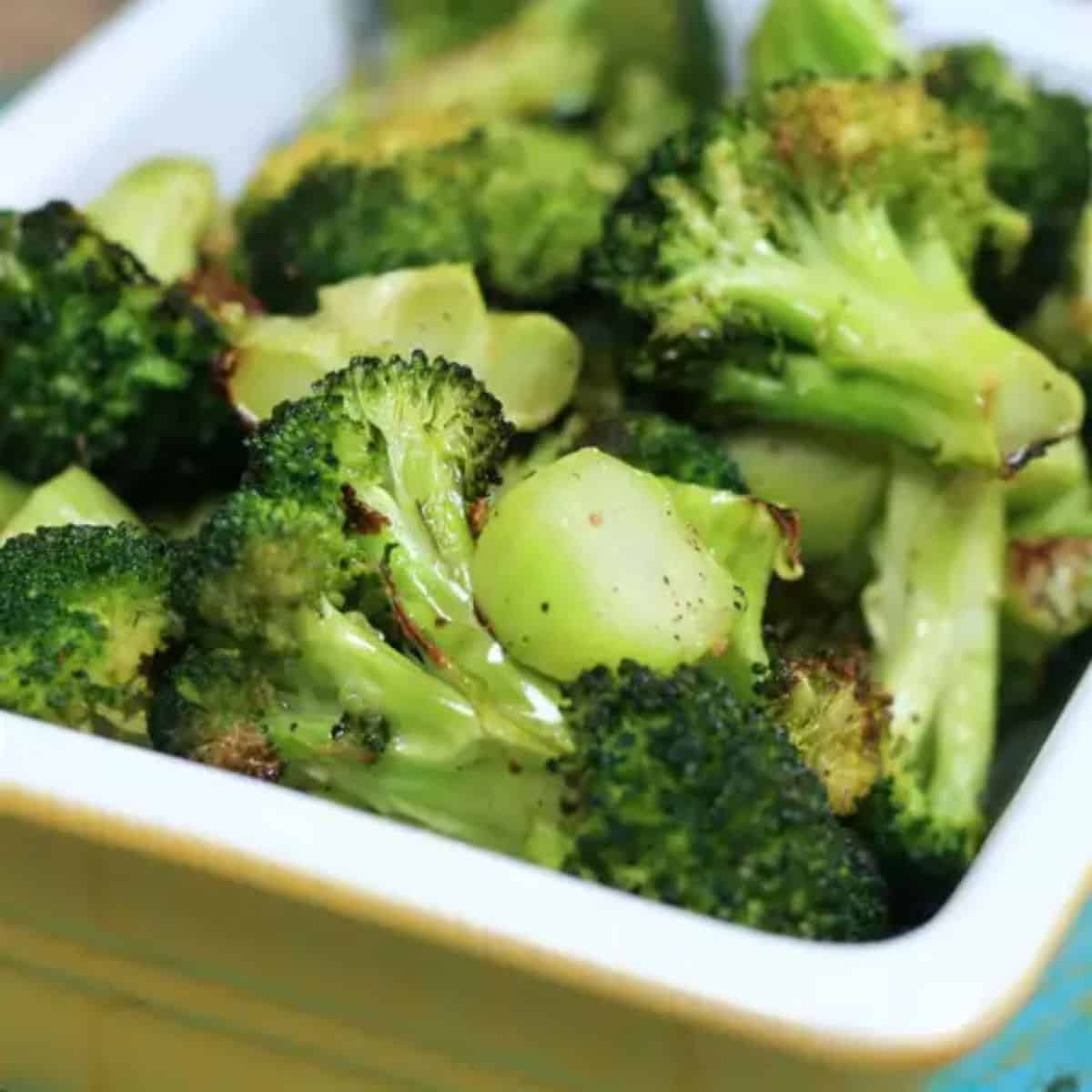 Healthy Easy Roasted Broccoli in a white bowl.