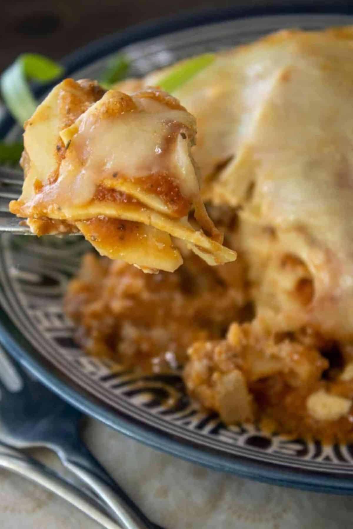Slow Cooker Lasagna on a decorative plate.