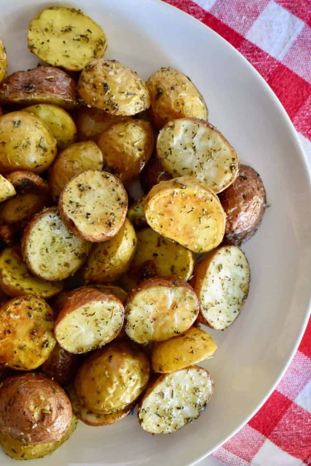 Healthy Italian Roasted Potatoes on a white plate.