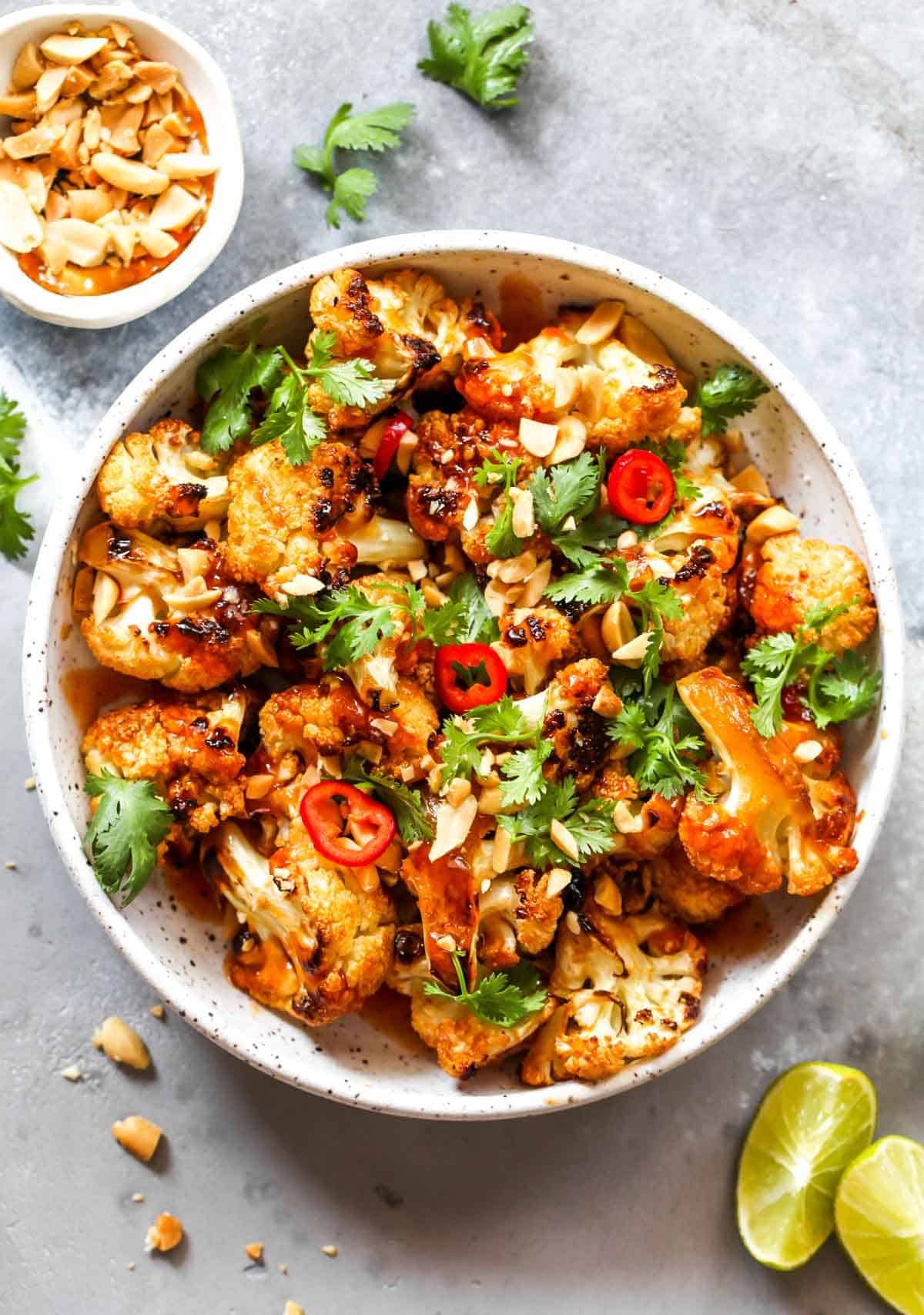 Delicious Asian BBQ Roasted Cauliflower in a white bowl.