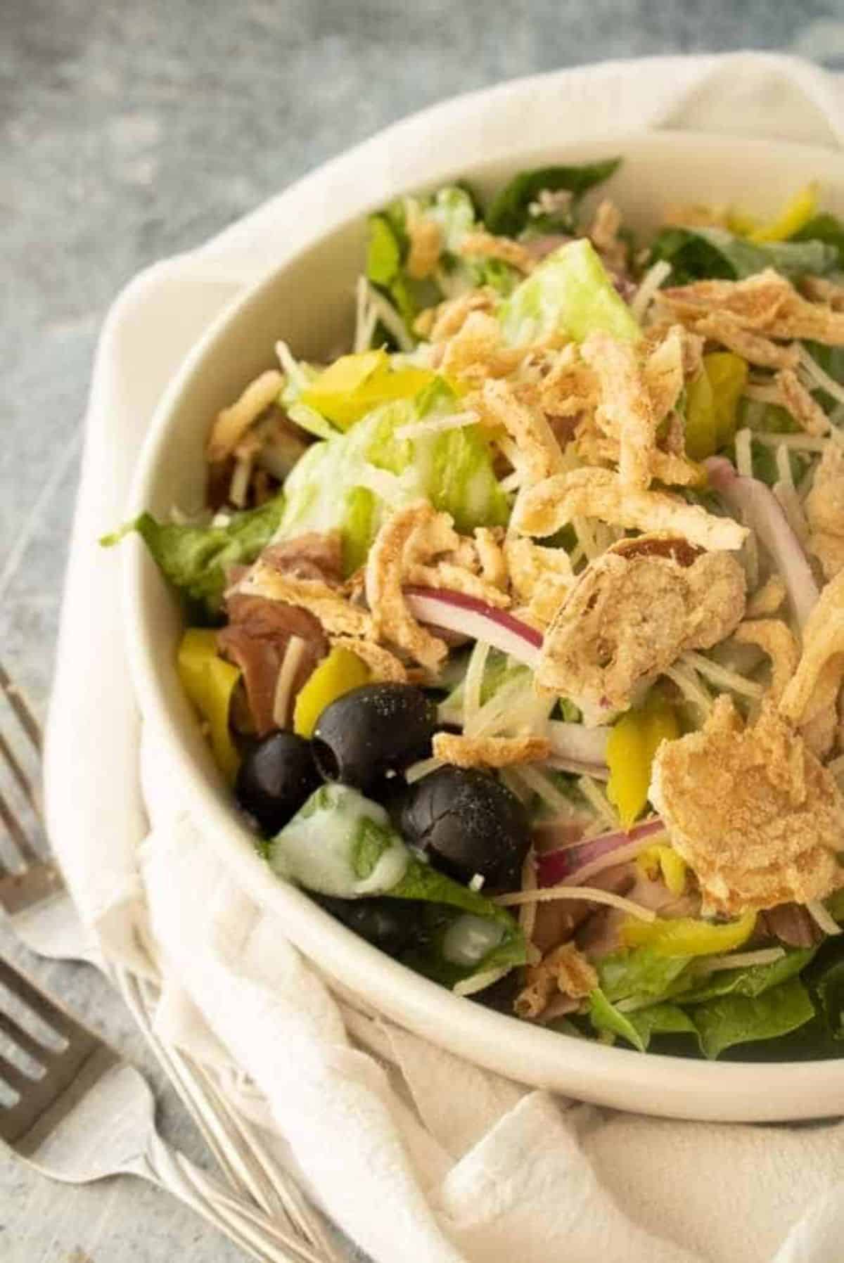 Roast Beef Salad in a white bowl.