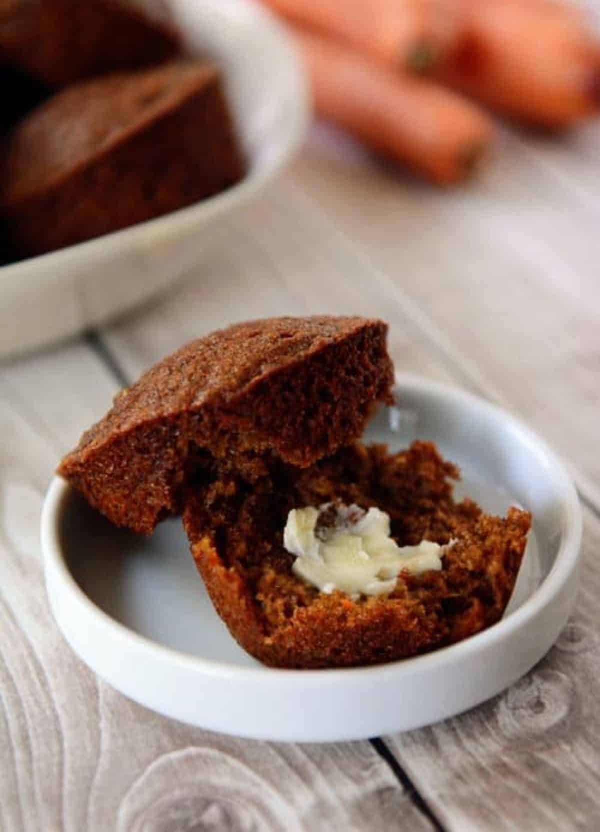 A torn Power Muffin on a small plate.