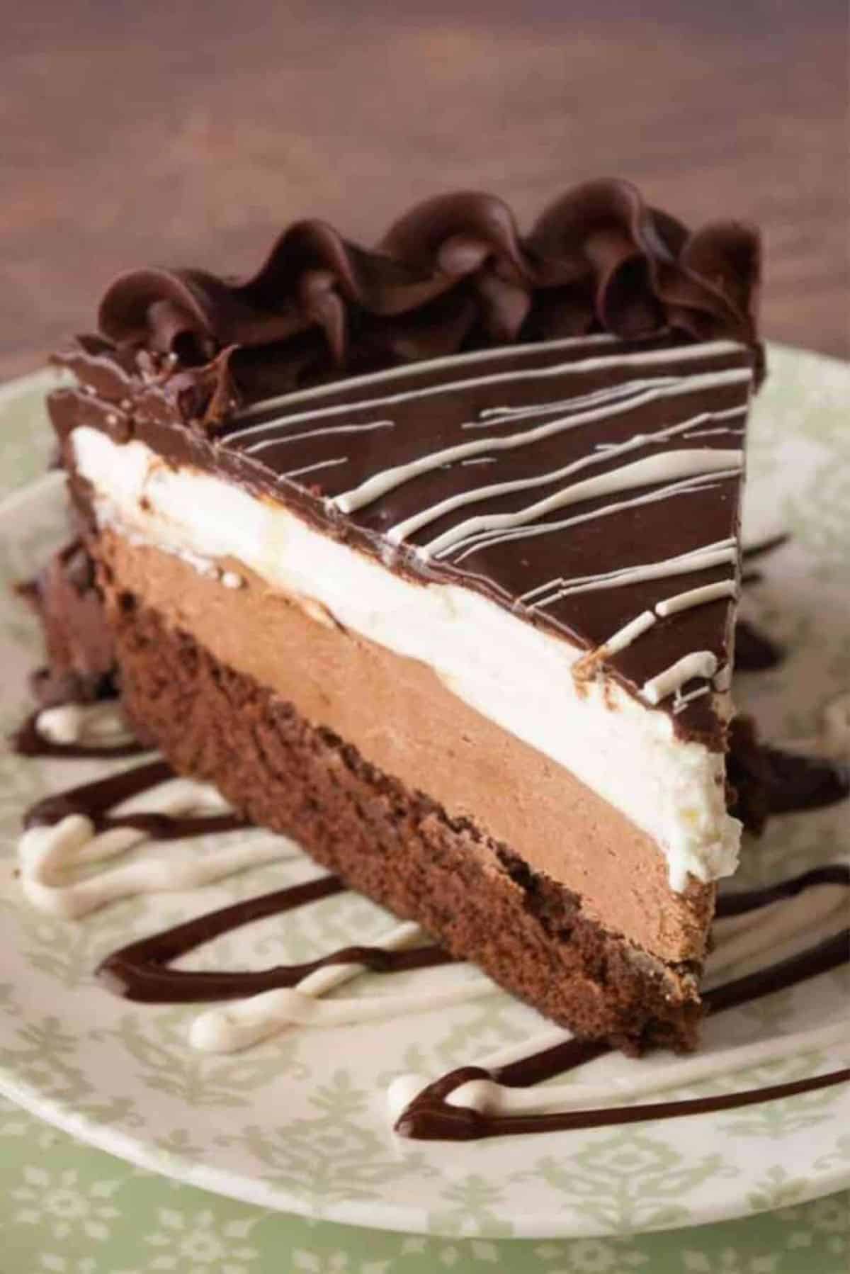 A piece of delicious Black Tie Mousse Cake on a plate.