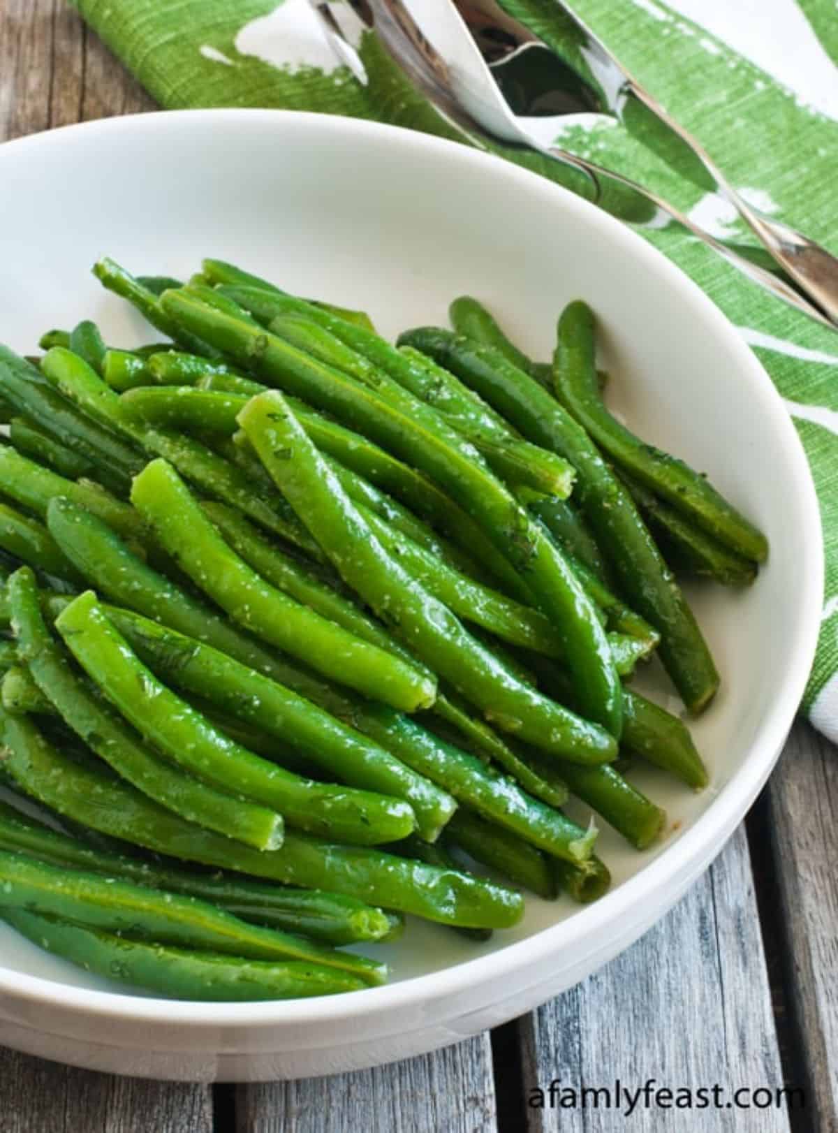 Healthy Green Beans With Tarragon in a white bowl.