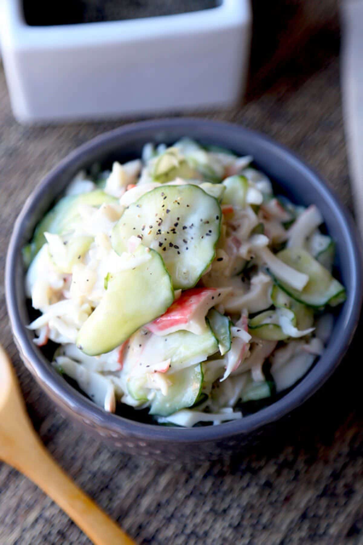 Healthy Kani Salad in a gray bowl.