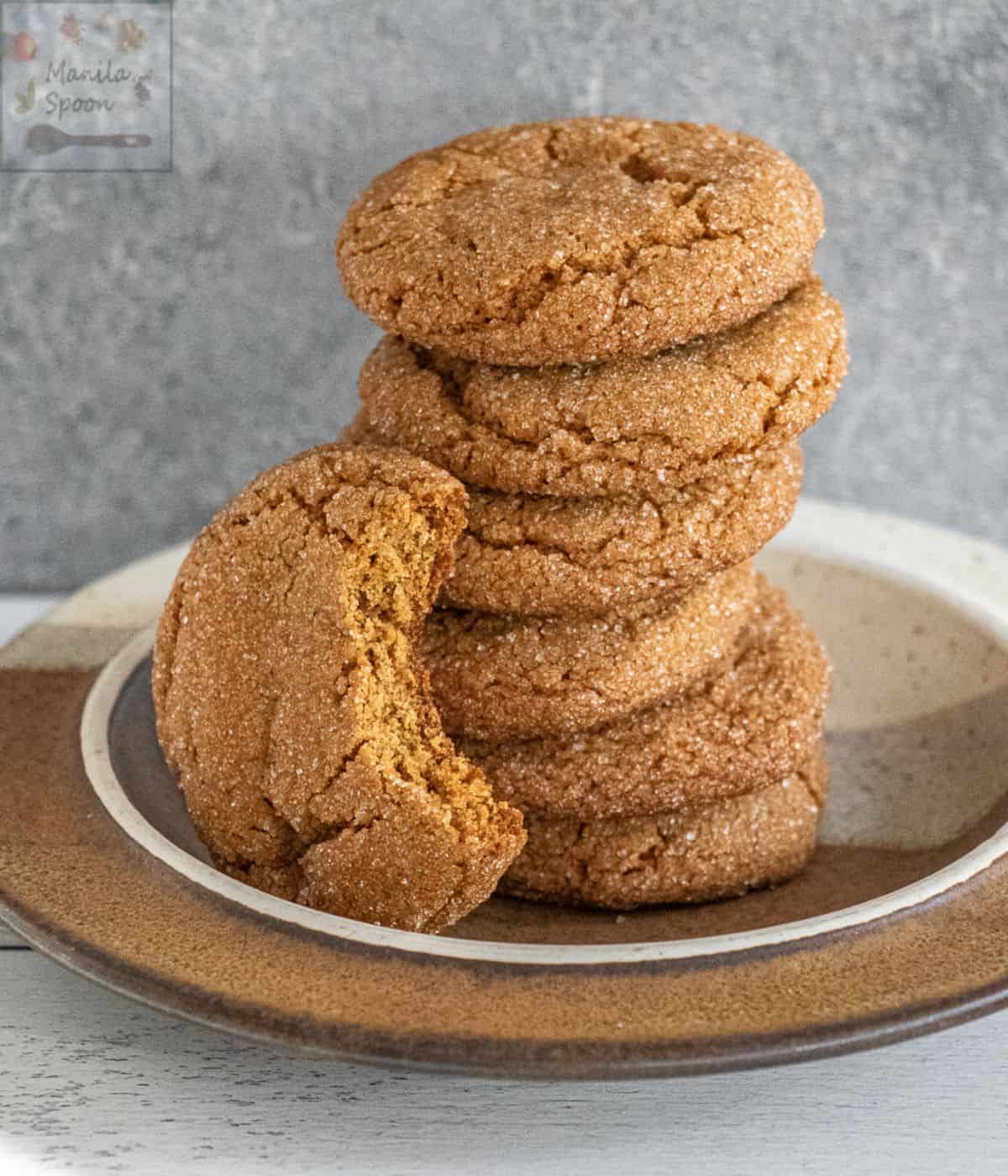 A pile of Spiced Cookies on a glass plate.
