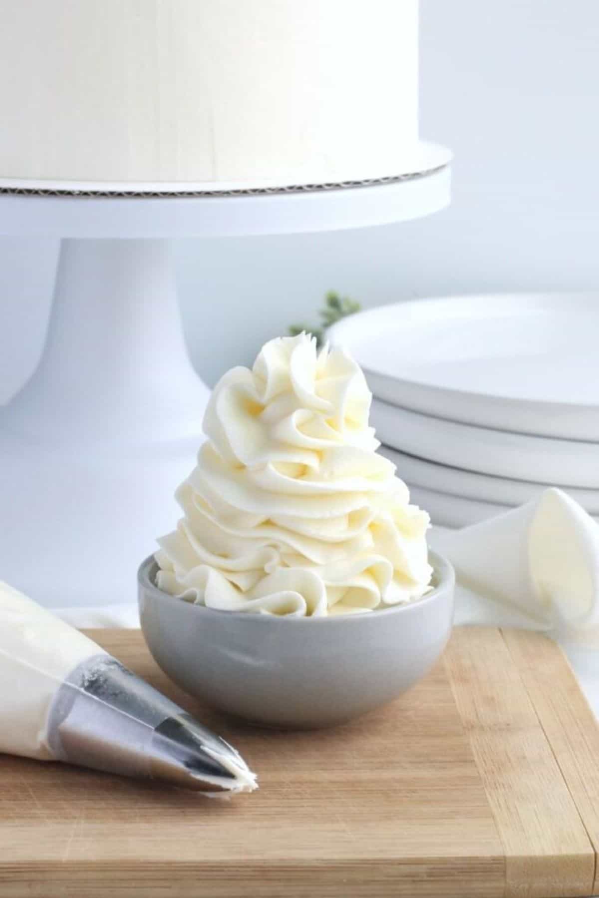 Almond Buttercream Frosting in a gray bowl.