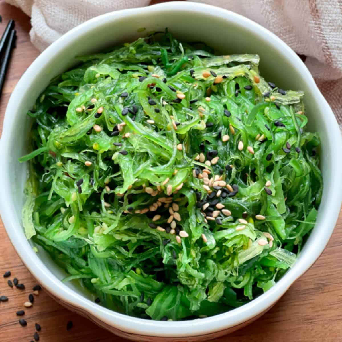 Delicious Japanese Seaweed Salad in a white bowl.