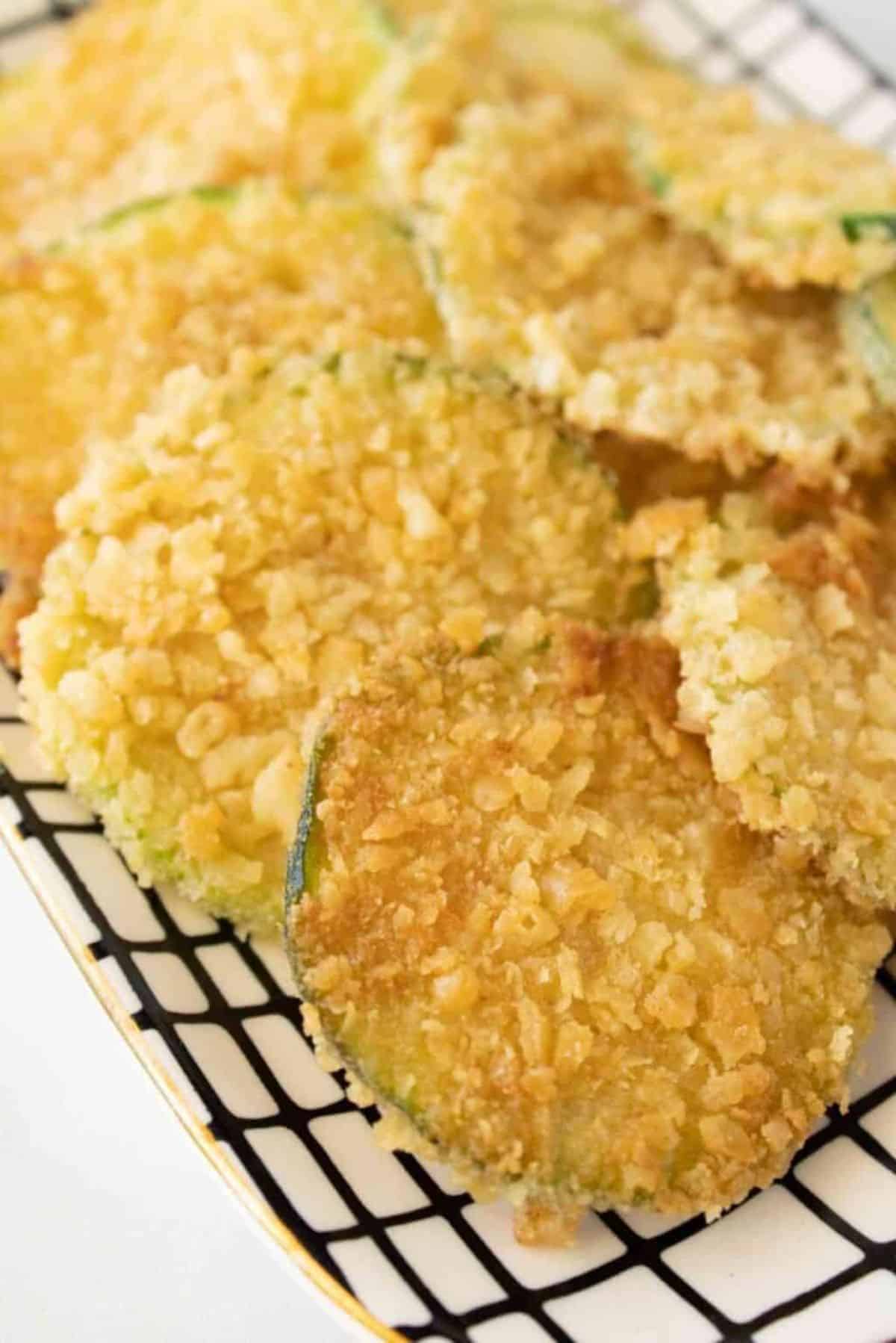 Crispy Fried Zucchini Chips on a tray.