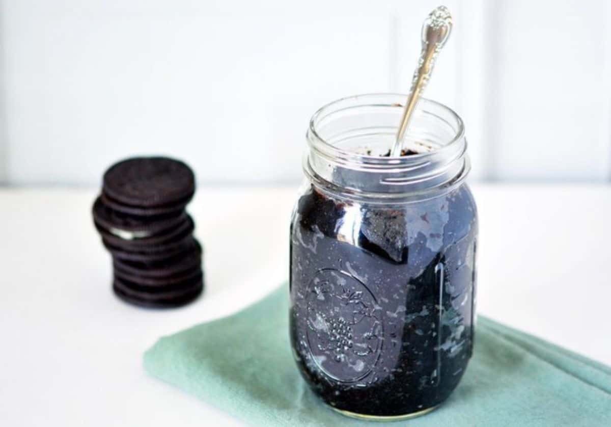Oreo Cookie Butter in a glass jar.