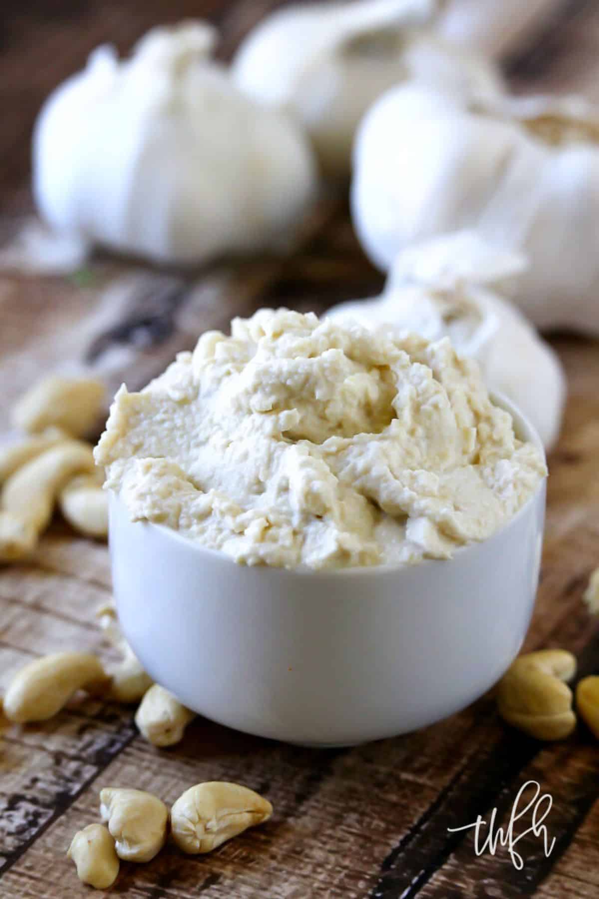 Vegan Garlic Cashew Spread in a small white bowl.