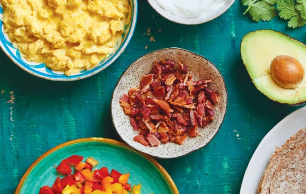 Breakfast Burrito Buffet on a blue table.