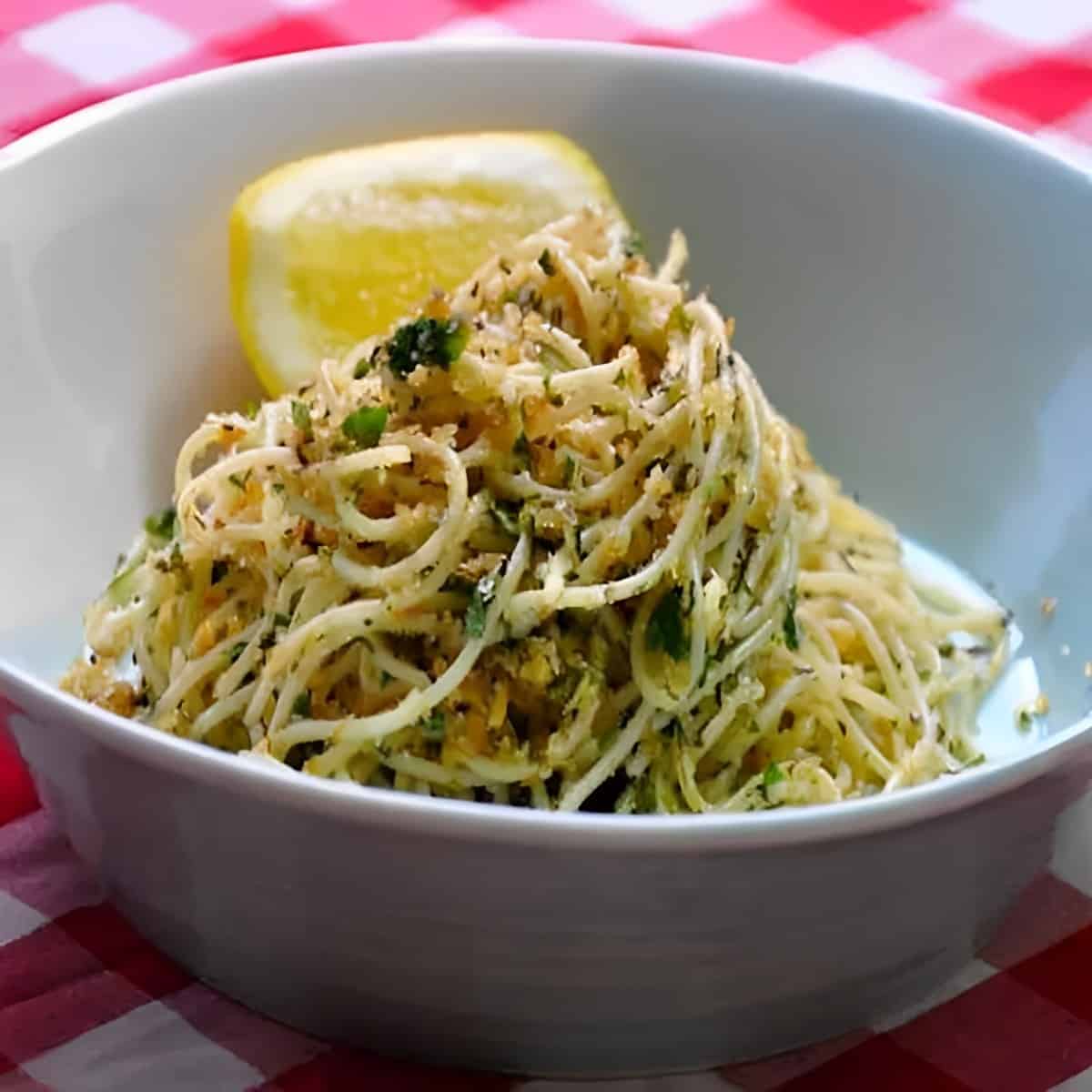 Garlic Spaghetti in a white bowl.