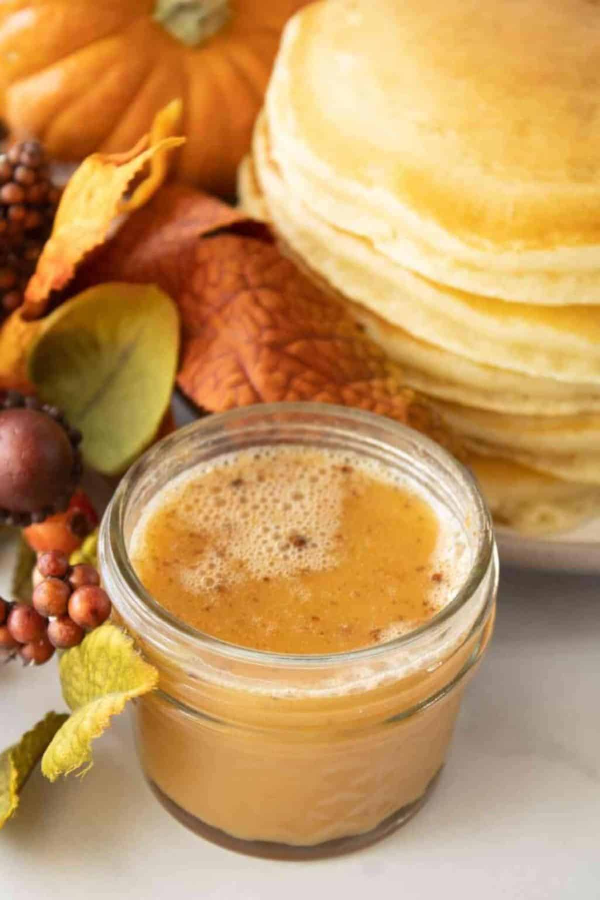 Pumpkin Pie Syrup in a glass jar.