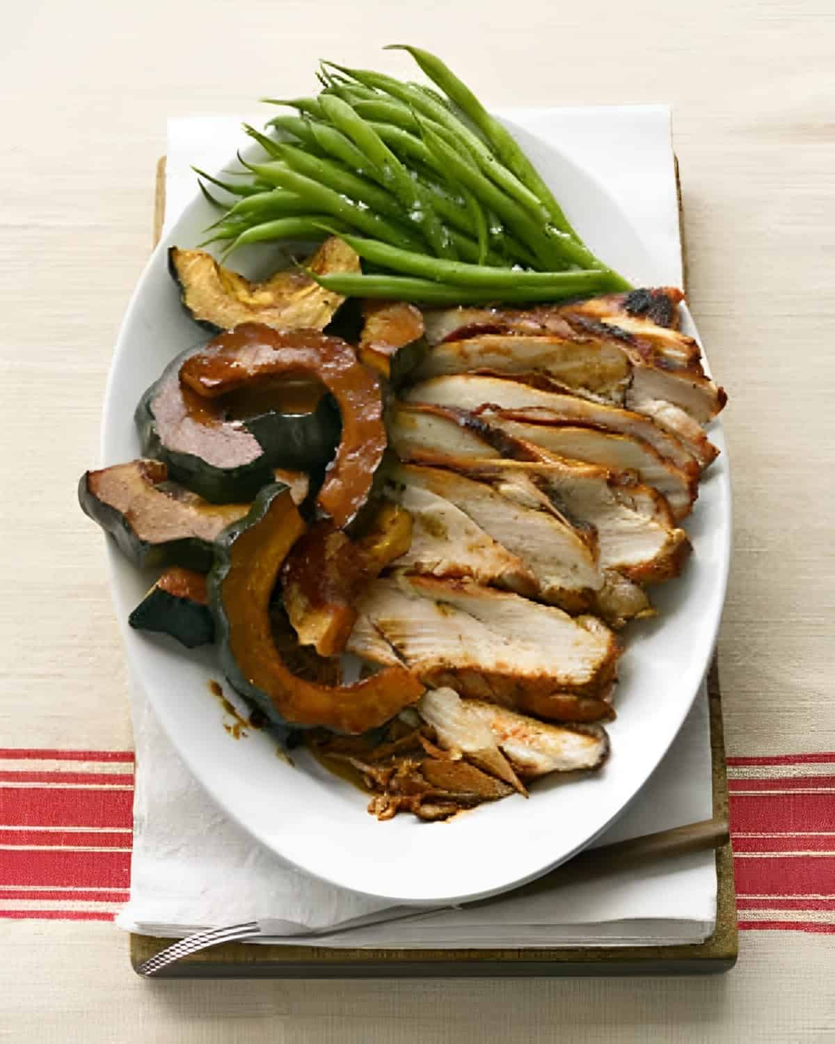 Turkey Breast and Squash on a white tray.