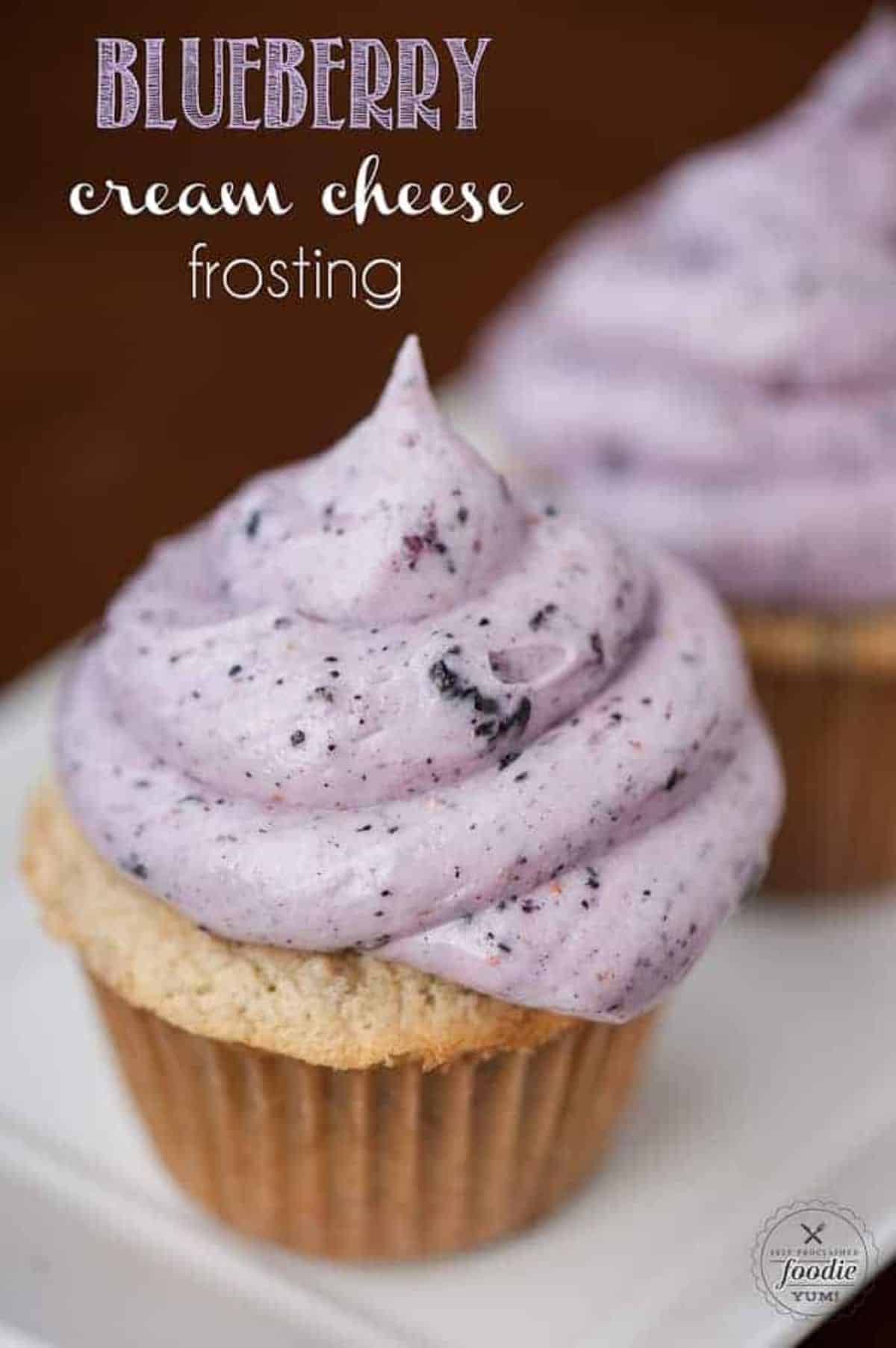 Blueberry Cream Cheese Frosting on a cupcake.
