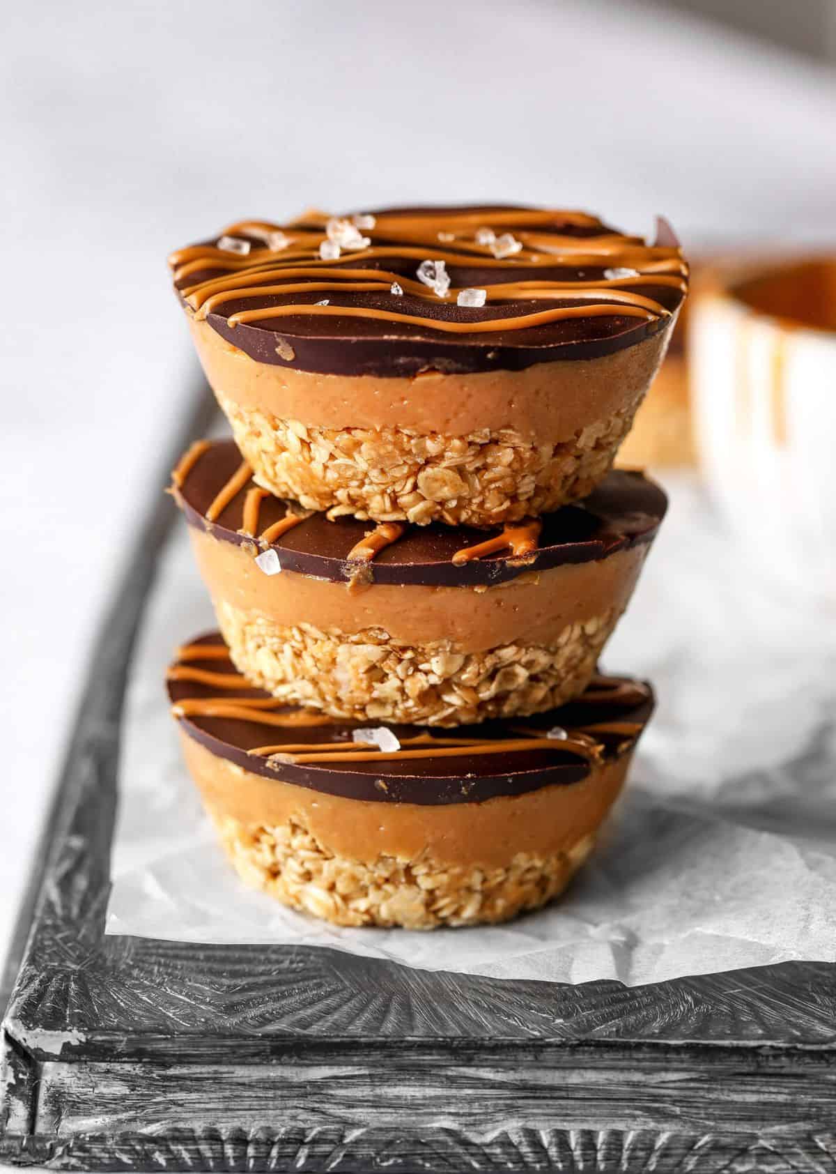 A pile of Peanut Butter Chocolate Oat Cups.