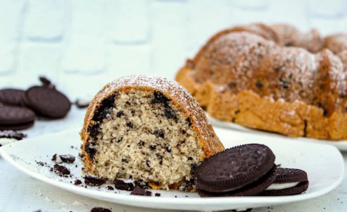 A piece of Oreo Cookie Pound Cake on a white plate.