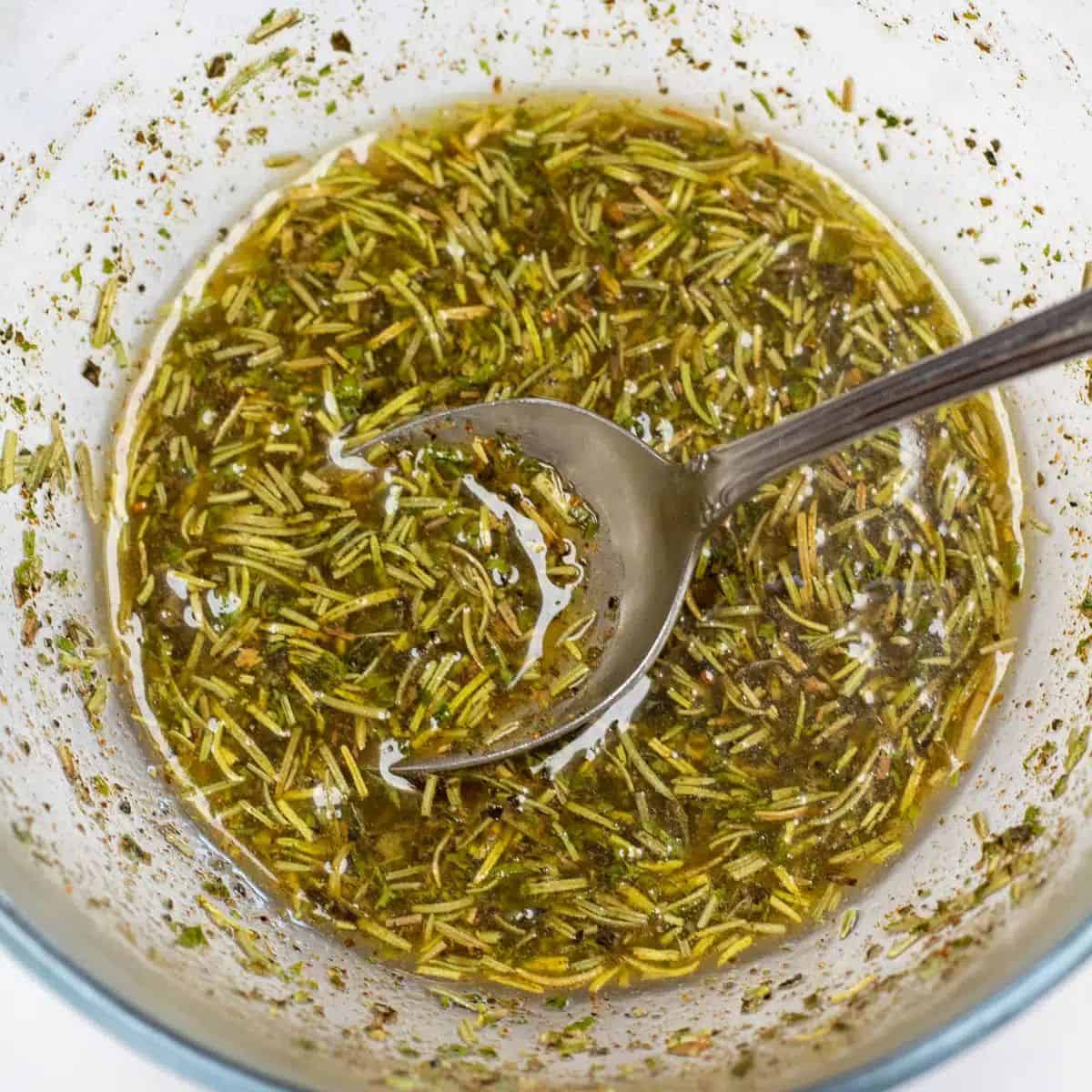 Easy Lamb Marinade in a bowl with a spoon.