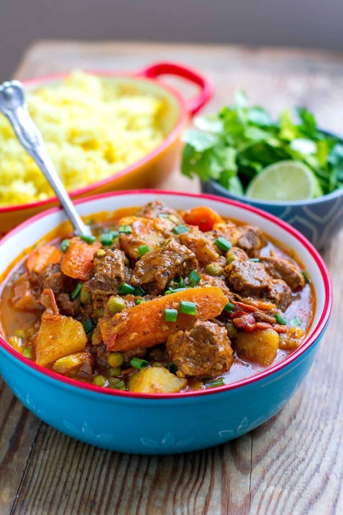 Instant Pot Moroccan Lamb Stew in a blue bowl.