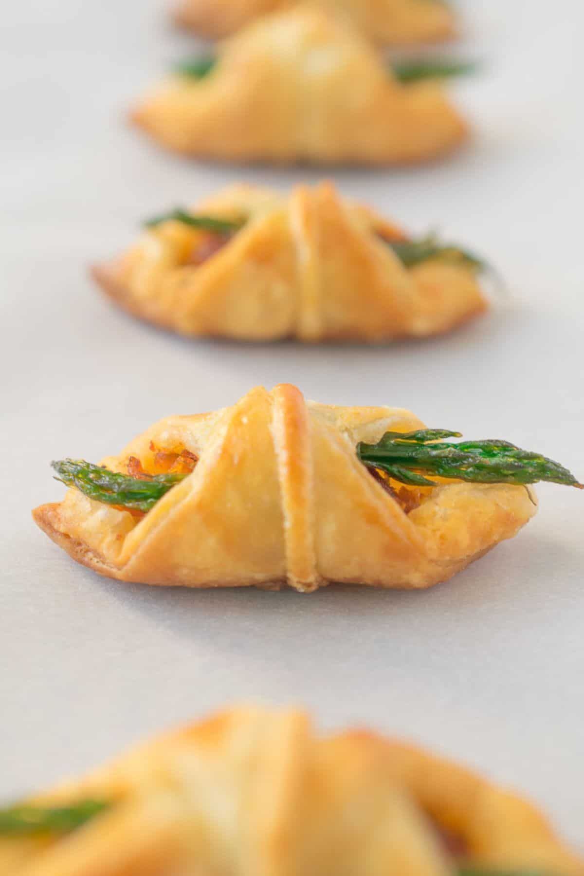 Delicious Puff Pastry Bites with Asparagus and Sun-dried Tomatoes.