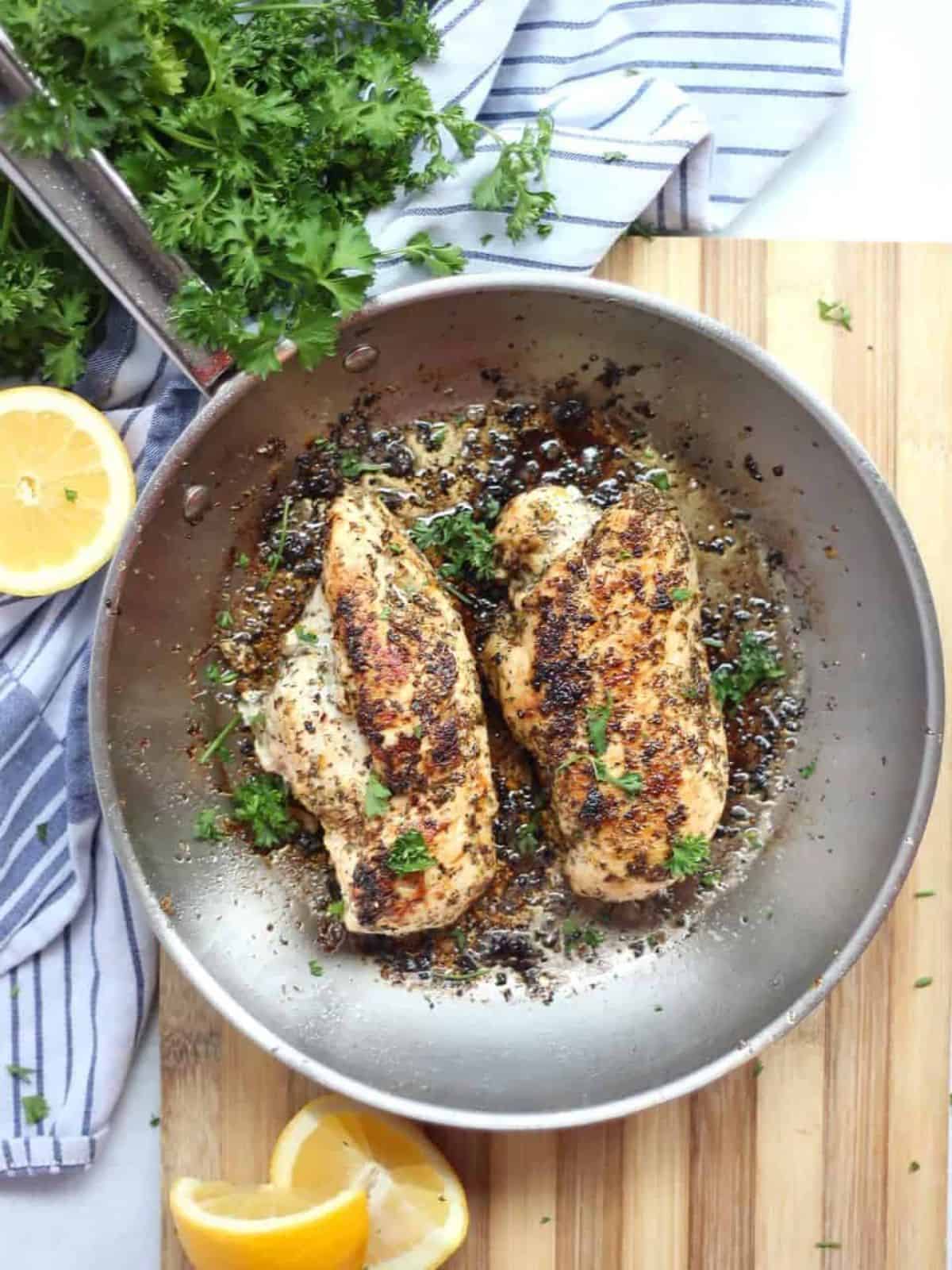 Lemon Oregano Chicken in a skillet.