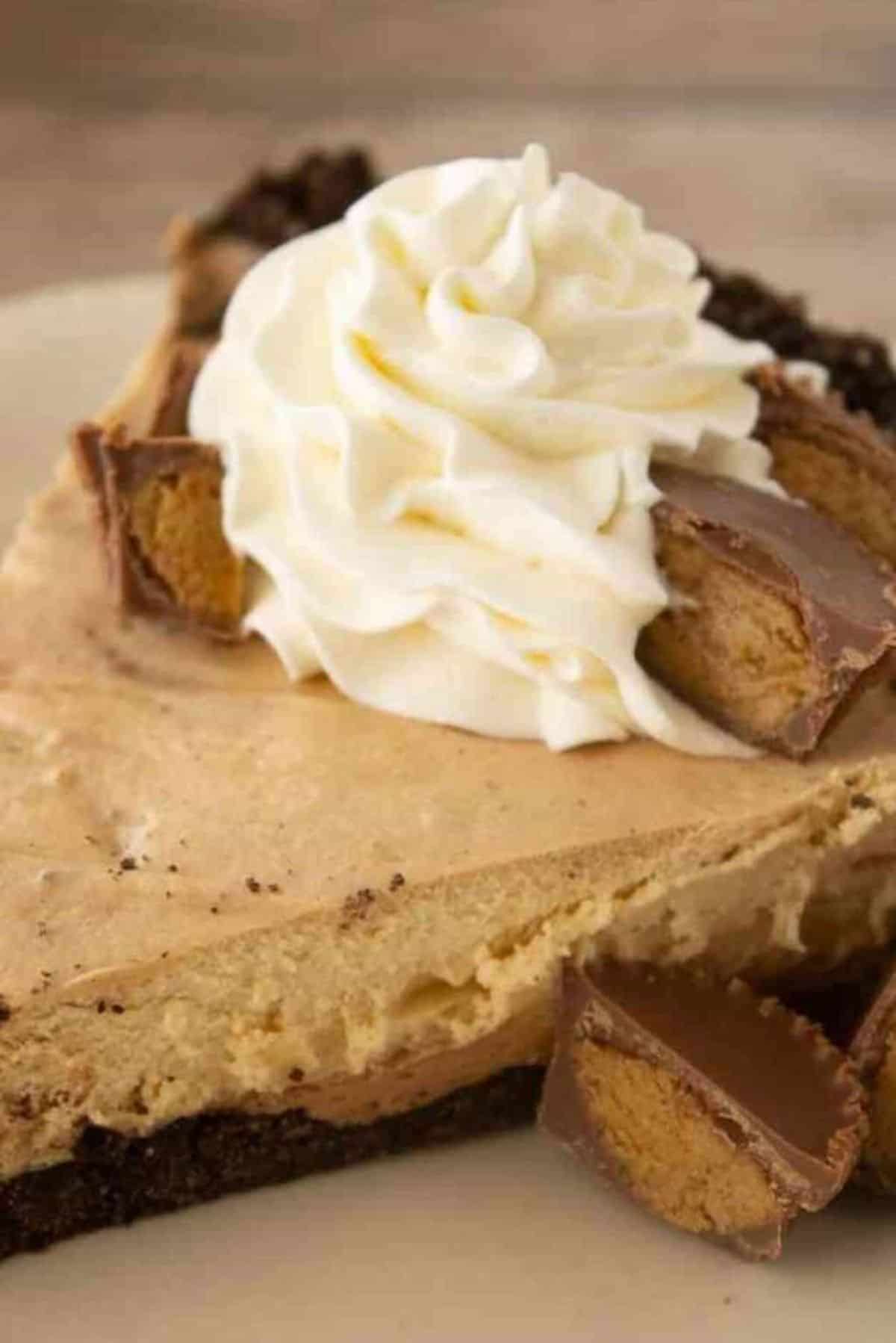 A slice od sweet Chocolate Peanut Butter Mousse Pie on a plate.