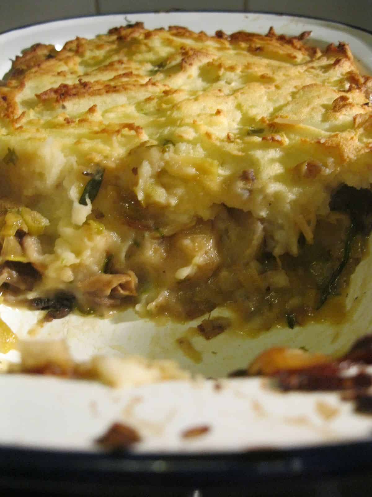 Leek, Mushroom, and Tarragon Shepherd's Pie in a white casserole.