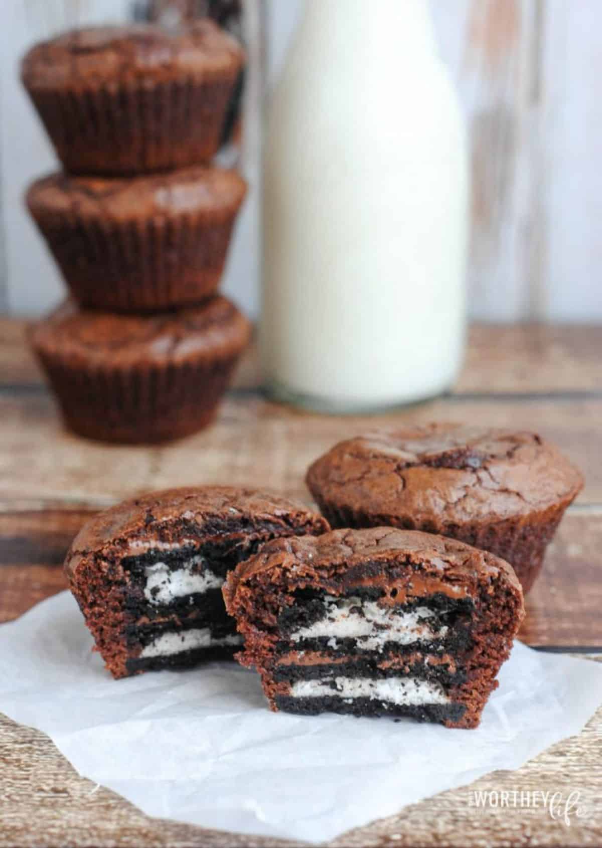 Nutella Oreo Brownies on a paper napkin on a wooden table.