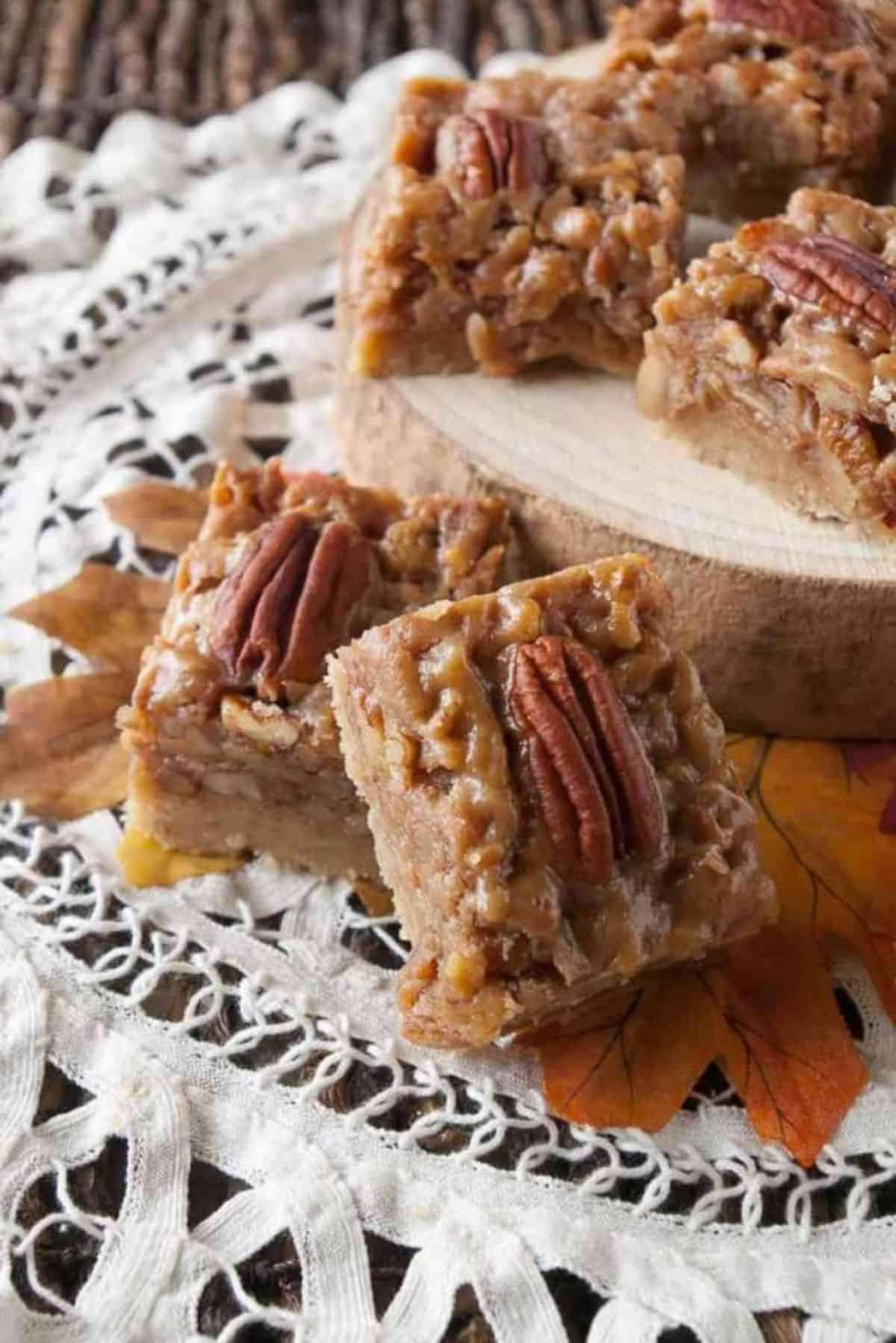 Scrumptious Amazing Pecan Pie Bars on a table.